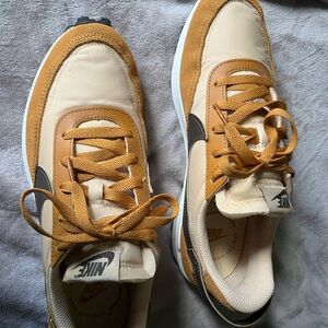 Nike Women’s Sneakers in Tan and yellow.